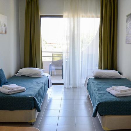 Ivory Hotel Theológos Buitenkant foto