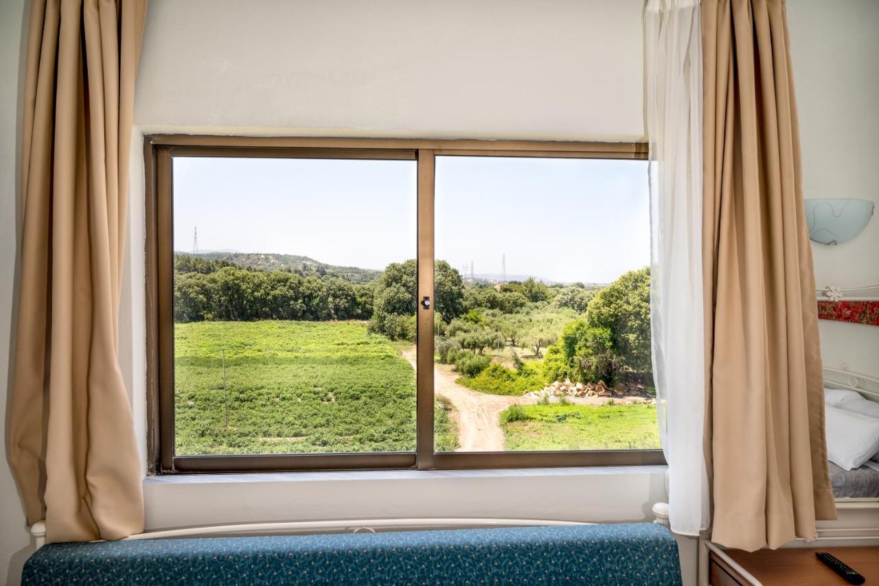 Ivory Hotel Theológos Buitenkant foto