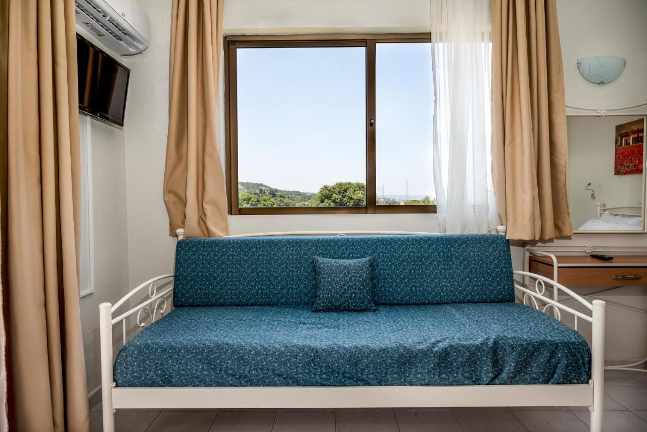 Ivory Hotel Theológos Buitenkant foto